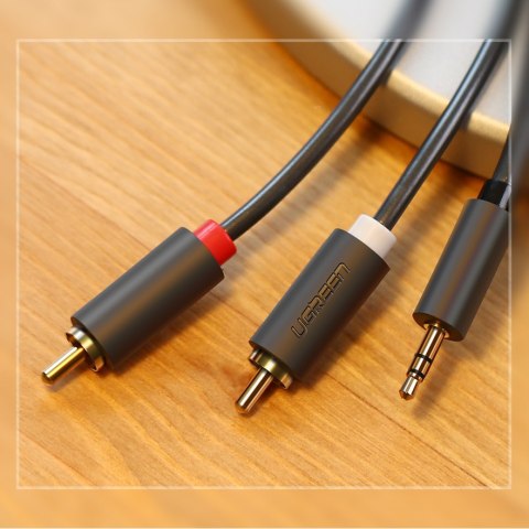 Kabel przewód audio 3.5 mm mini jack - 2x RCA 1.5m czarny UGREEN